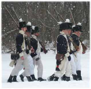 Members of Lacroix�s recreated militia company on the march at the 2005 Commemoration of the Batttle of the River Raisin.                                          